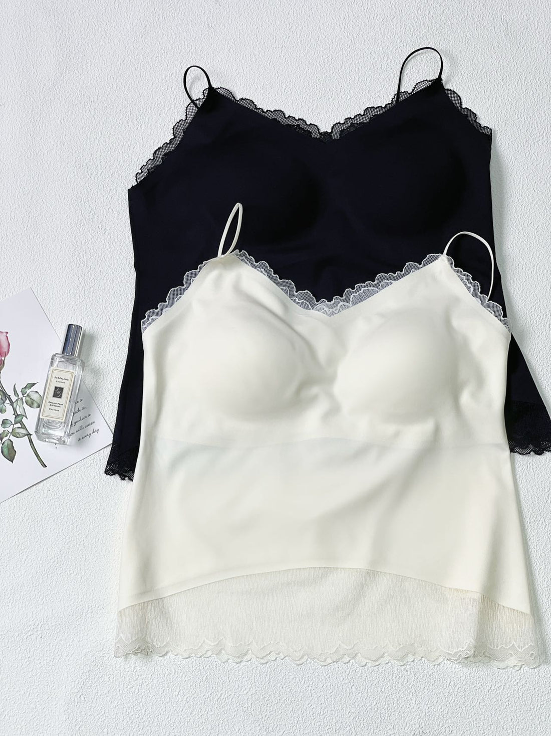 Supplier photo showing the actual black and ivory 8091 camisoles