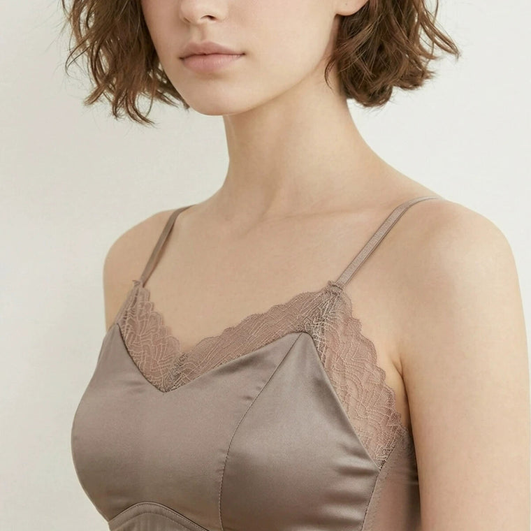 Adult woman wearing the champagne silk soft-cup bralette